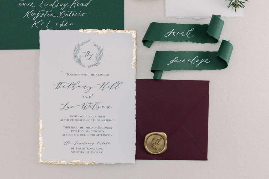 Gold foil wedding invitation with calligraphy
