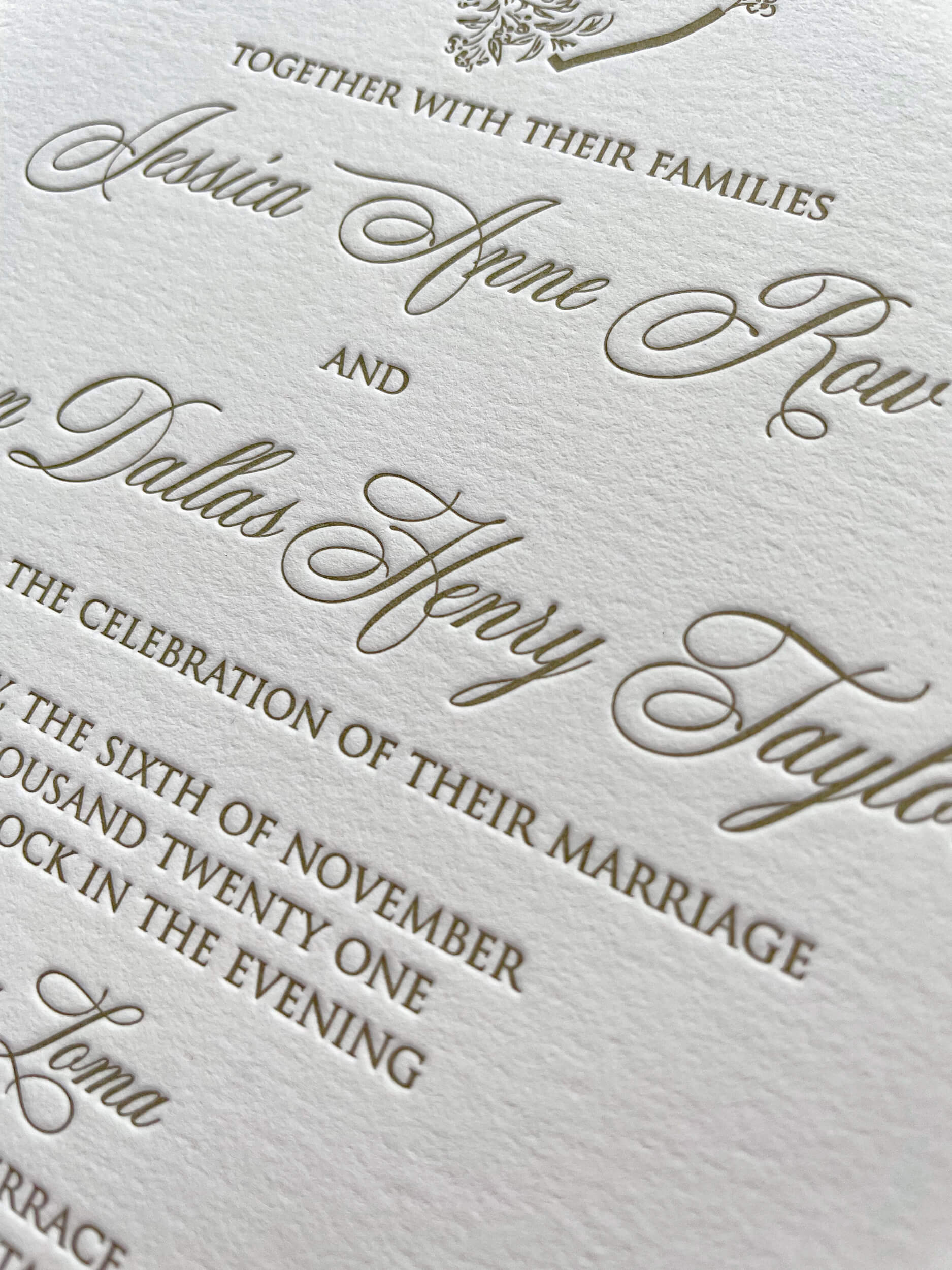 Letterpress invitation on cotton cardstock with gold text